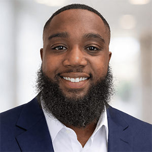 Professional man with beard in navy blazer